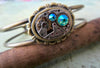 Steampunk Bracelet - In the Works - Steampunk watch parts cuff - Peridot bracelet - Repurposed - Steampunk jewelry - August Birthday